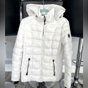Woman’s white Nautica Puffer winter jacket
